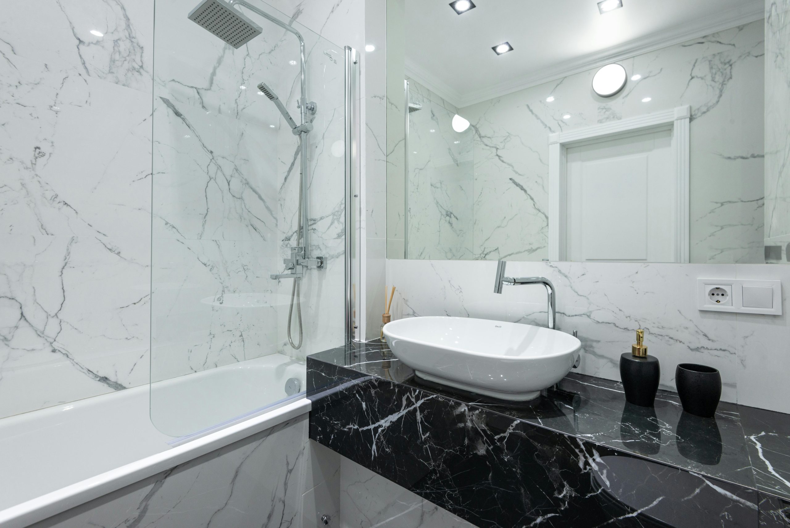 Modern bathroom remodel featuring a luxury freestanding tub and custom tile, representing the best ROI home improvements Spokane homeowners can choose.